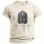 T-shirt with a graphic of a suit, pocket watch, and text "Gentleman Groom".