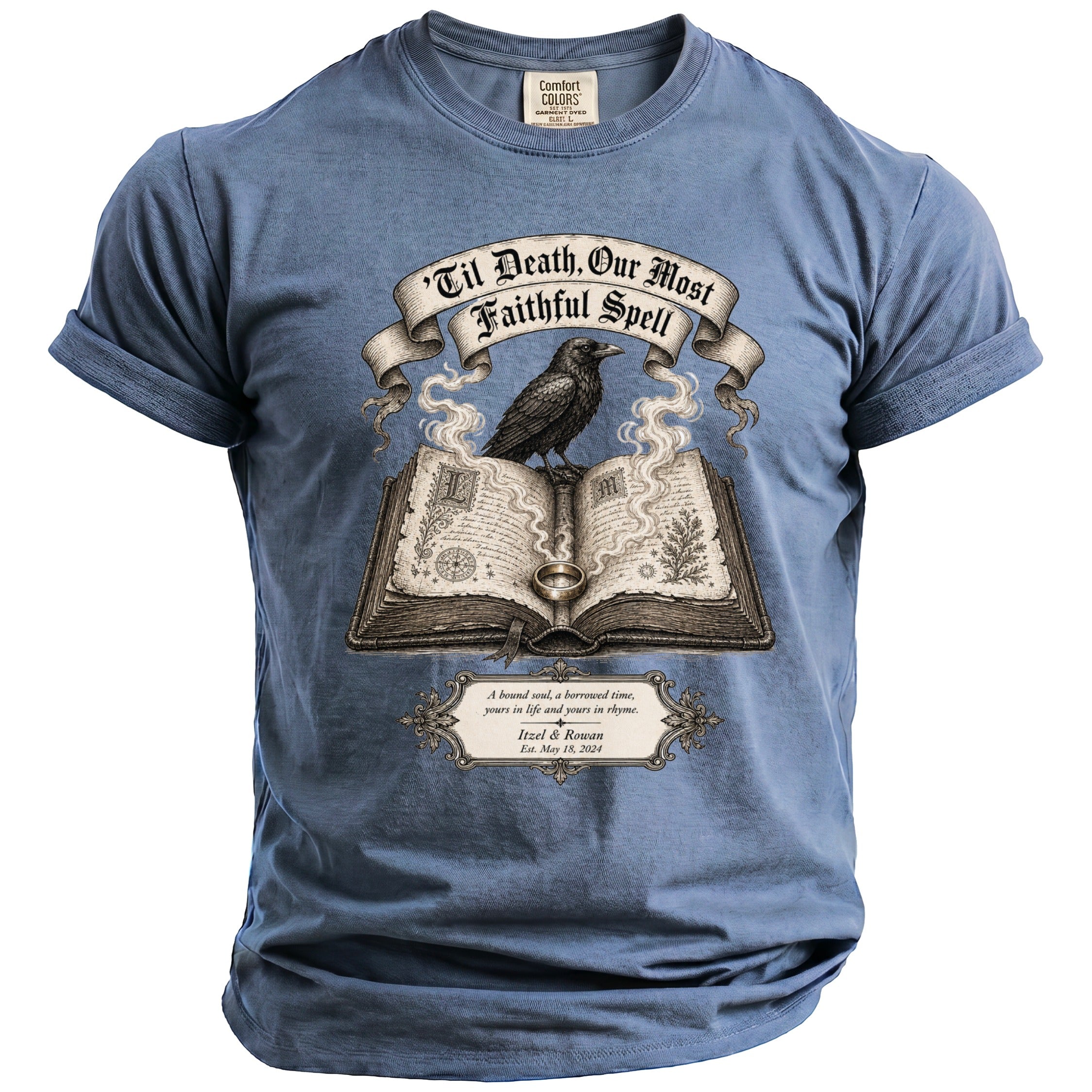 Blue t-shirt with raven perched on an open book, quoting "Til Death, Our Most Faithful Spell."