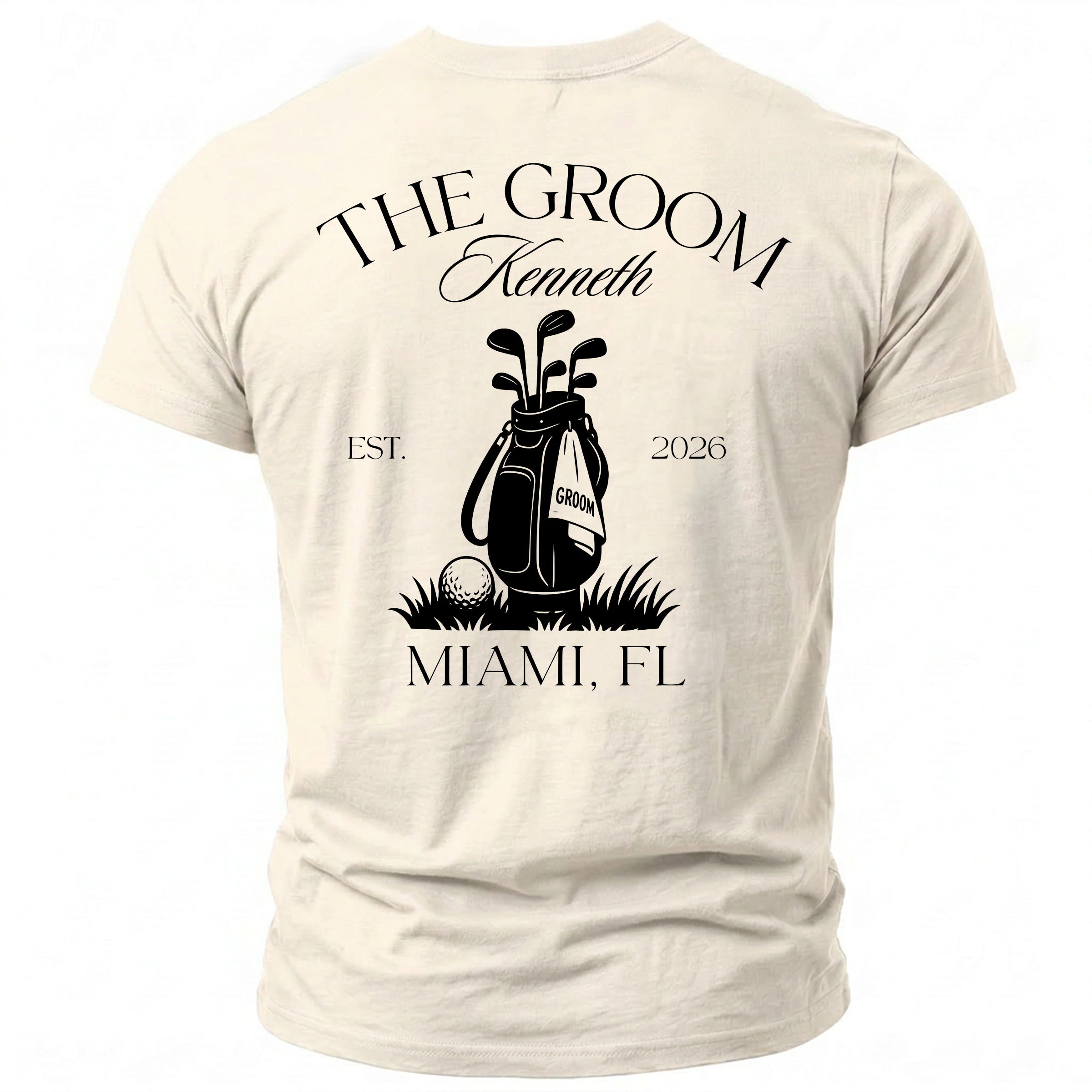 Cream t-shirt with "The Groom Kenneth" and golf bag graphic.