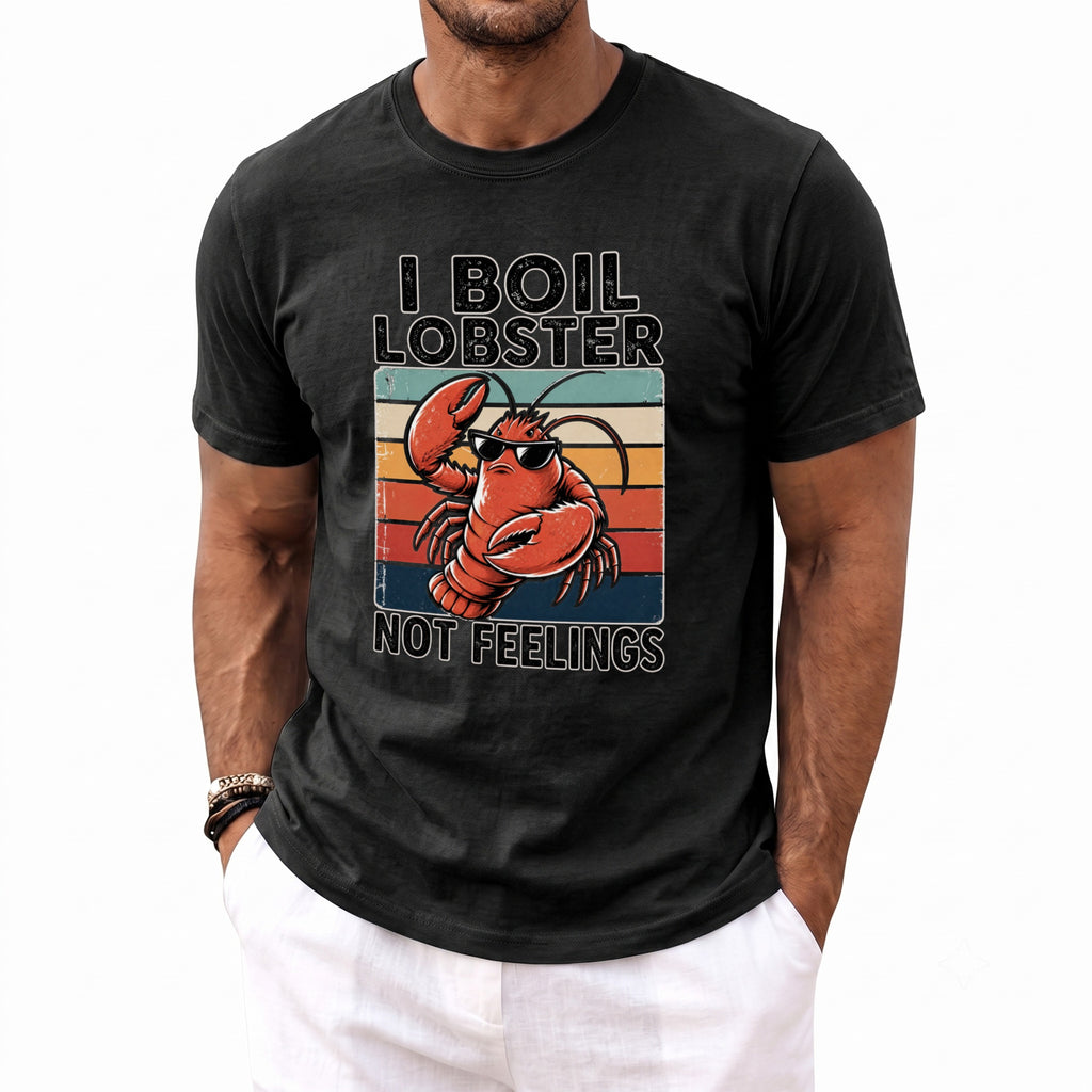 Black t-shirt graphic with lobster wearing sunglasses and text "I boil lobster not feelings".