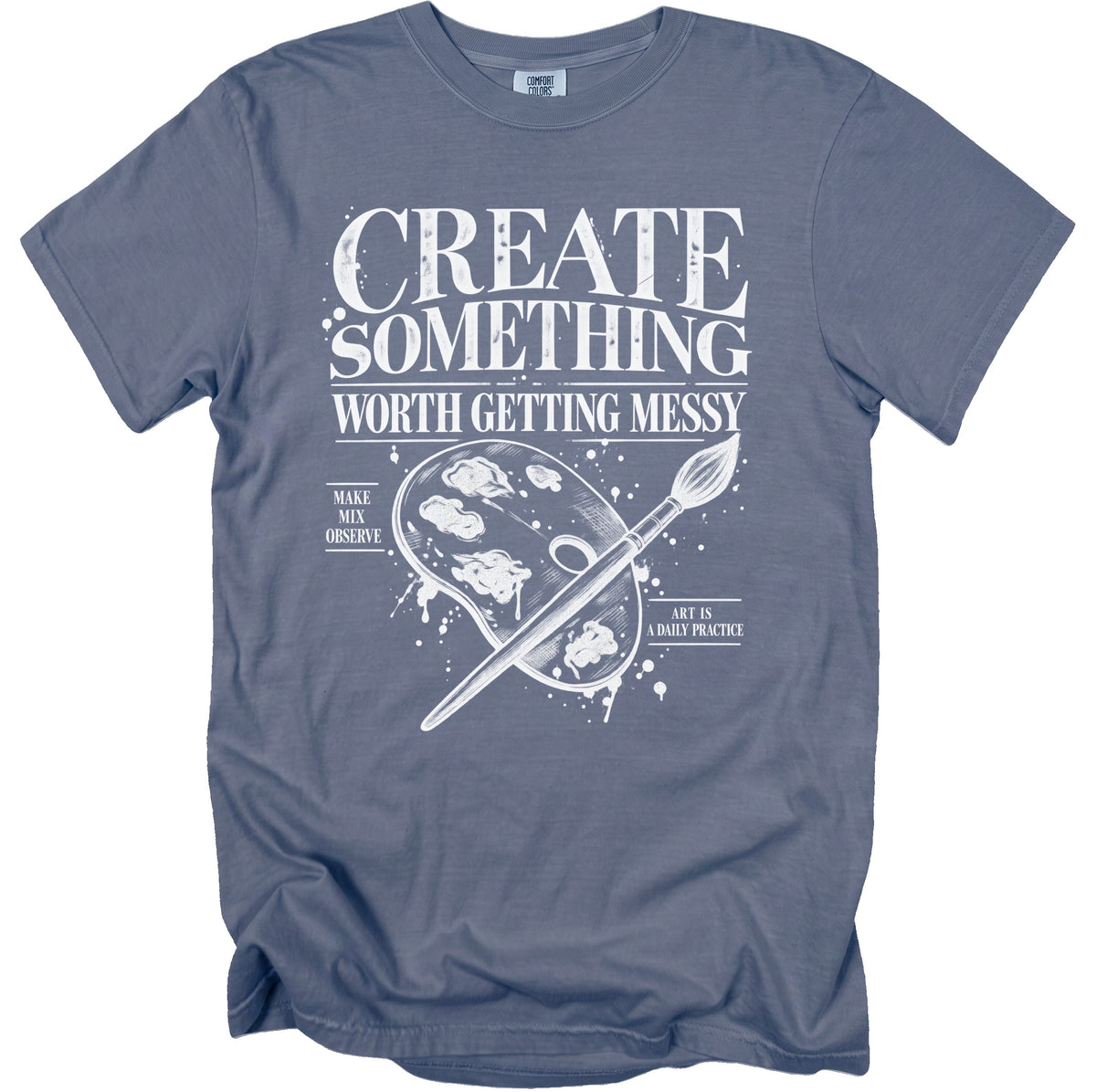 Blue t-shirt with "CREATE SOMETHING WORTH GETTING MESSY" and art supplies graphic.