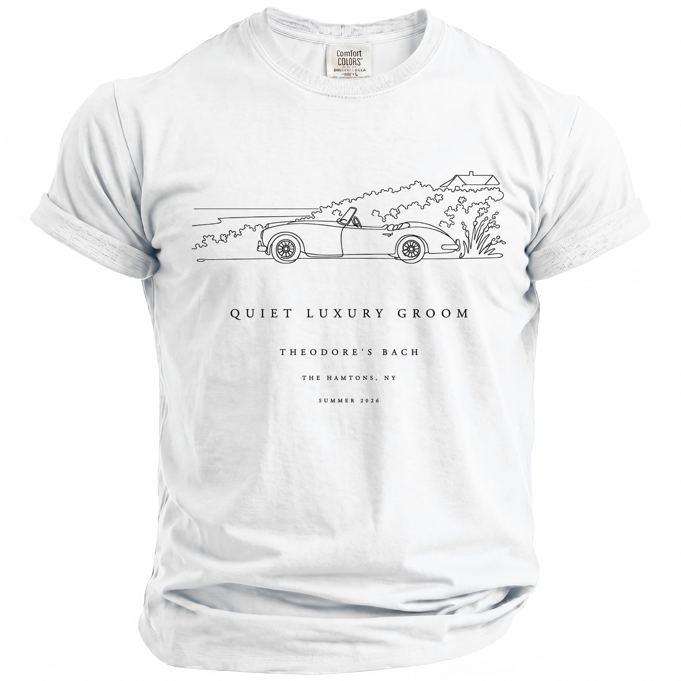 White t-shirt with a line drawing of a convertible and text "QUIET LUXURY GROOM THEODORE'S BACH THE HAMTONS, NY SUMMER 2026".