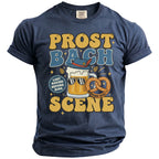 Navy t-shirt with "Prost Bach" graphic featuring sunglasses-wearing beer, pretzel, and "Munchen 2026" text.