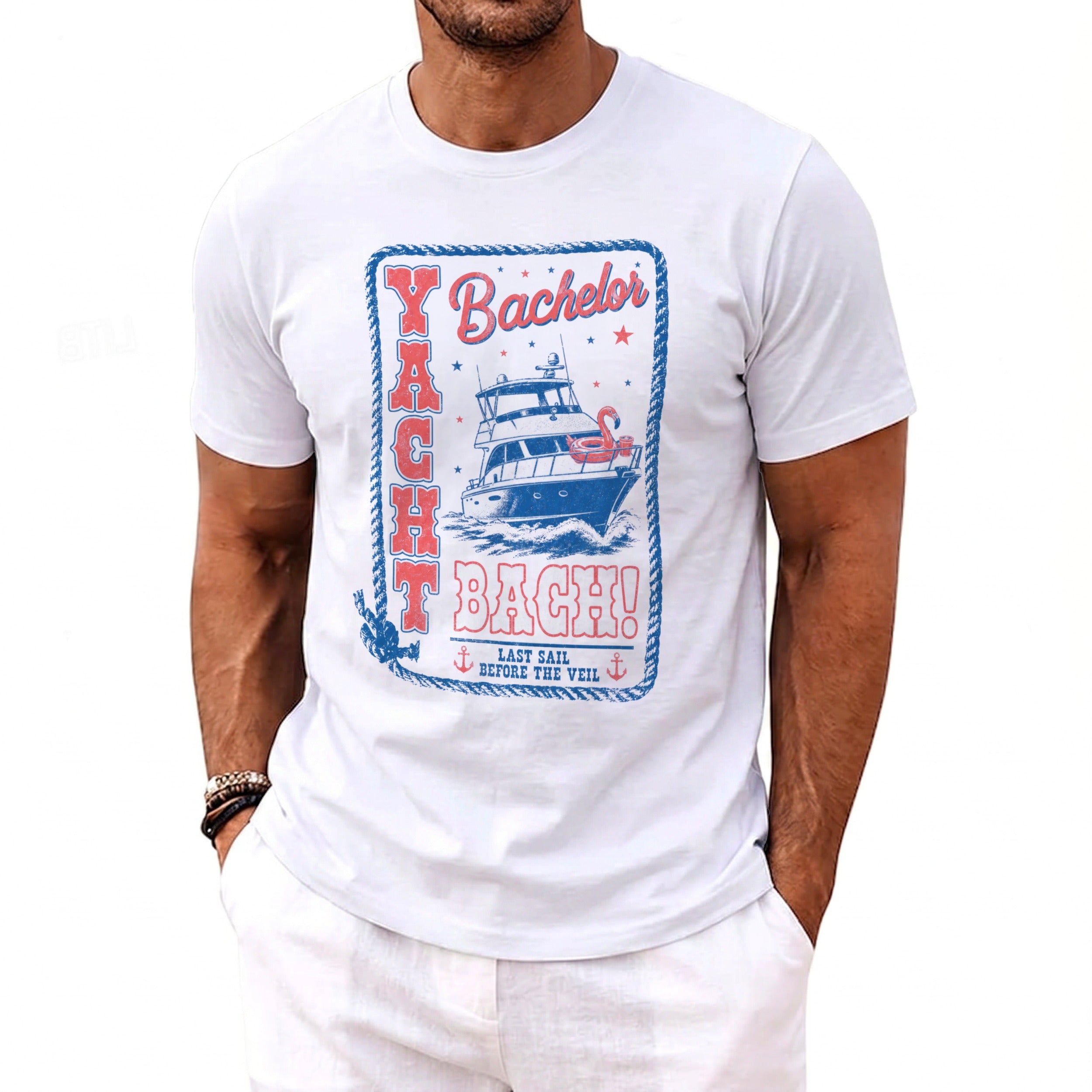 A man wearing a white t-shirt featuring a blue and red graphic with the text Yacht Bach and Last Sail Before The Veil.
