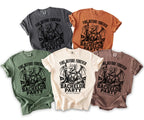 Five t-shirts in different colors with a dragon graphic and "Bachelor Party" text.