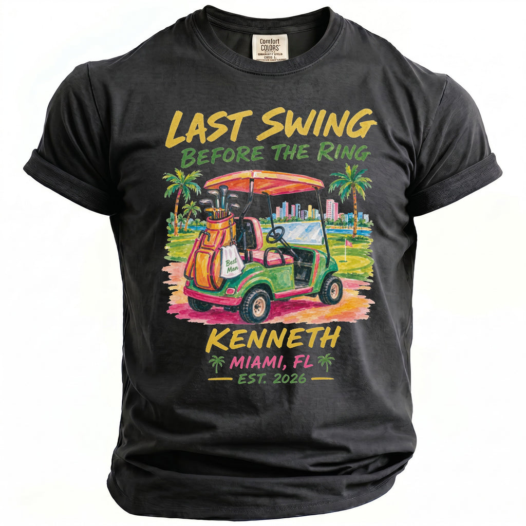 T-shirt graphic with golf cart, palm trees, city skyline, and text: Last Swing Before The Ring, Kenneth, Miami, FL, Est. 2026.