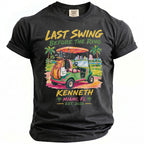 T-shirt graphic with golf cart, palm trees, city skyline, and text: Last Swing Before The Ring, Kenneth, Miami, FL, Est. 2026.