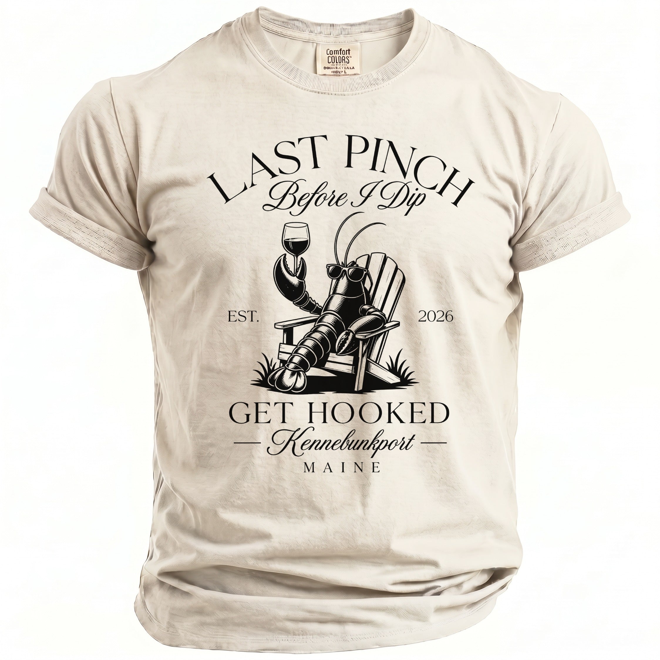 T-shirt with lobster in chair, glass of wine, and text "Last Pinch Before I Dip Get Hooked Kennebunkport Maine".