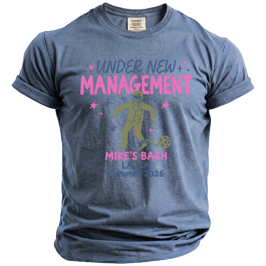 Blue t-shirt with "Under New Management Mike's Bach LA CA Summer 2026" text and graphics.