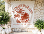 White banner with red "Bachelor Beach Club" text, palm trees, sunset, and waves.