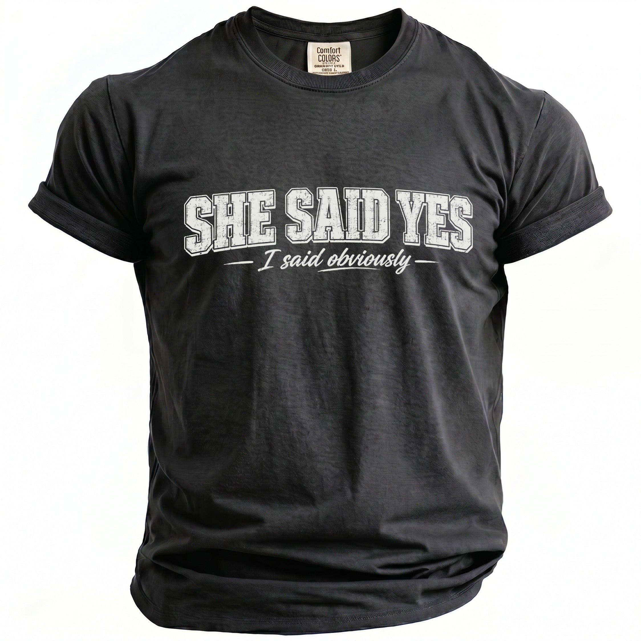 Dark grey t-shirt with "SHE SAID YES - I said obviously" printed on the front.