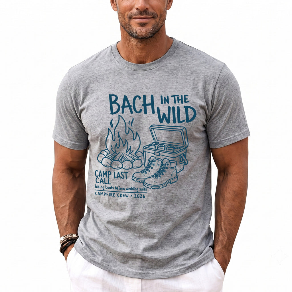 Grey t-shirt with "Bach in the Wild" graphic featuring campfire, cooler, and boots.