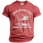 Red t-shirt with "Bachelor Beach Club" and "Groom's Last Wave 2026" graphics.