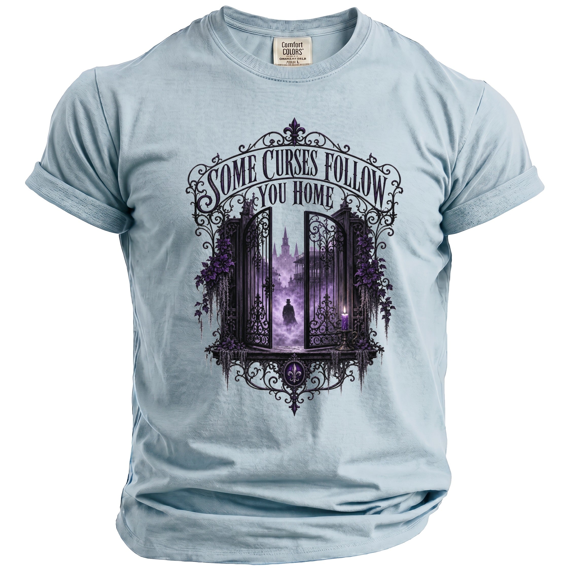 Light blue t-shirt with ornate gate graphic and text "SOME CURSES FOLLOW YOU HOME".