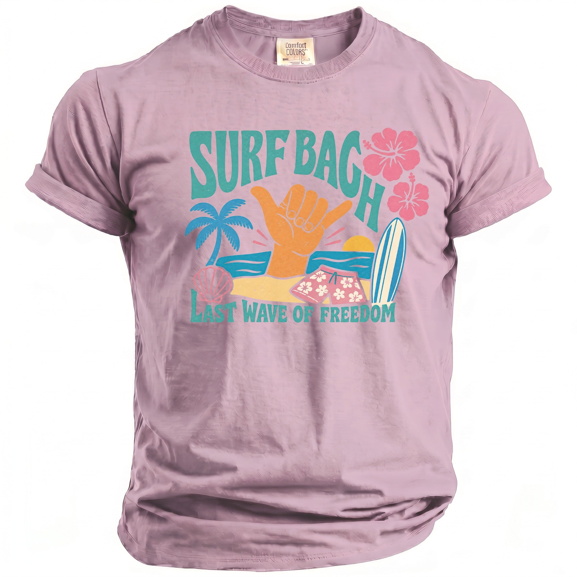 Pink t-shirt with "Surf Bagh Last Wave of Freedom" graphic and beach scene.
