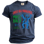 Navy t-shirt with "UNDER NEW MANAGEMENT MIKE'S BACH" text and graphic.