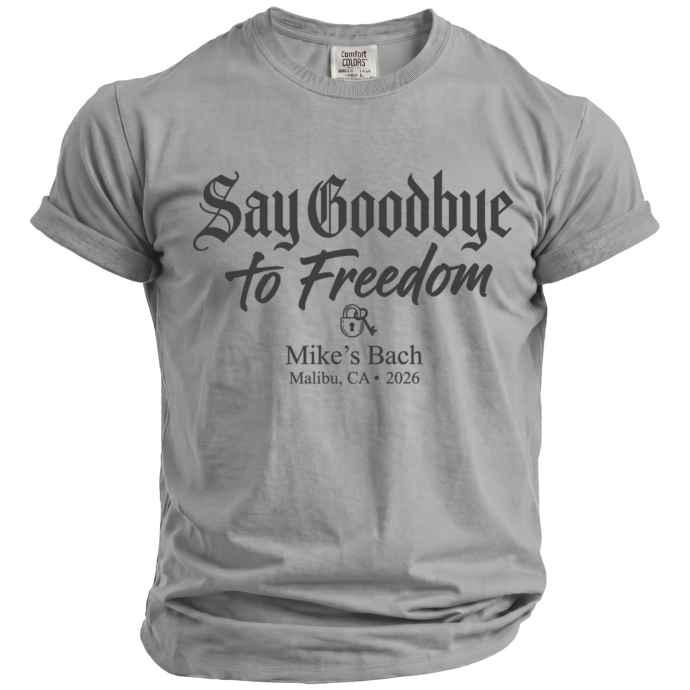 Grey t-shirt with "Say Goodbye to Freedom, Mike's Bach, Malibu, CA • 2026" printed on front.