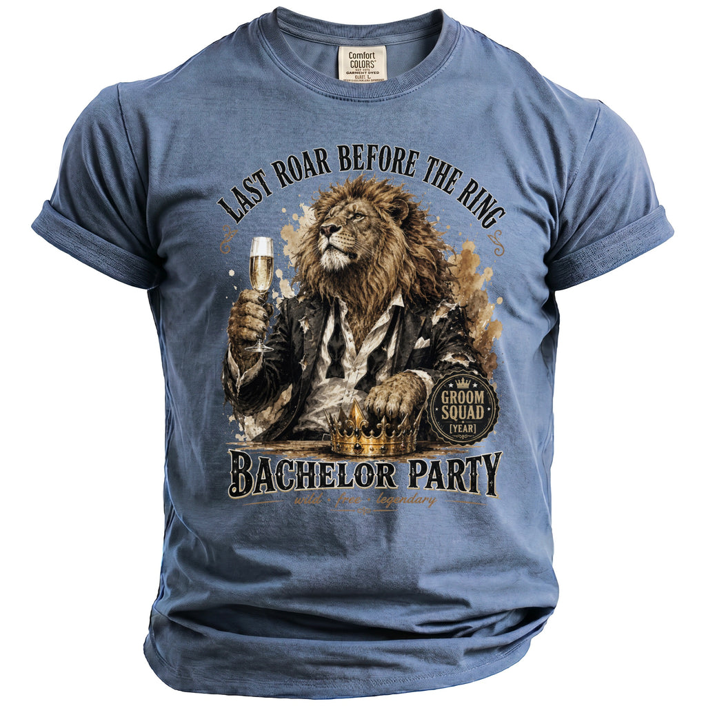 Blue t-shirt with a lion in a suit holding champagne and text about a bachelor party.