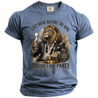 Blue t-shirt with a lion in a suit holding champagne and text about a bachelor party.