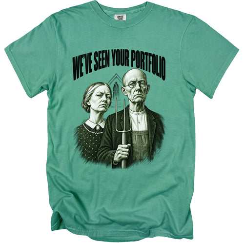 T-shirt with "WE'VE SEEN YOUR PORTFOLIO" text above American Gothic parody.