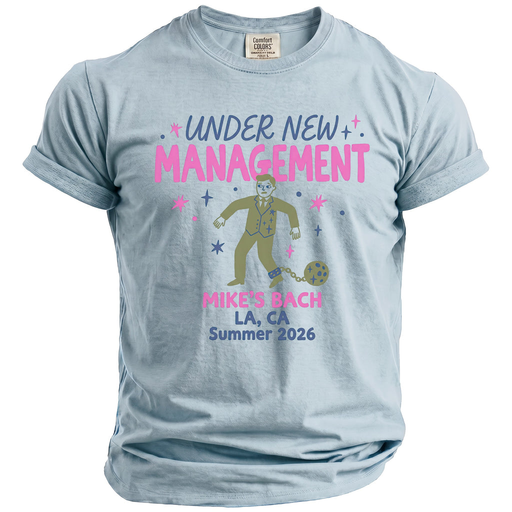 Light blue t-shirt with "Under New Management" and bachelor party details.