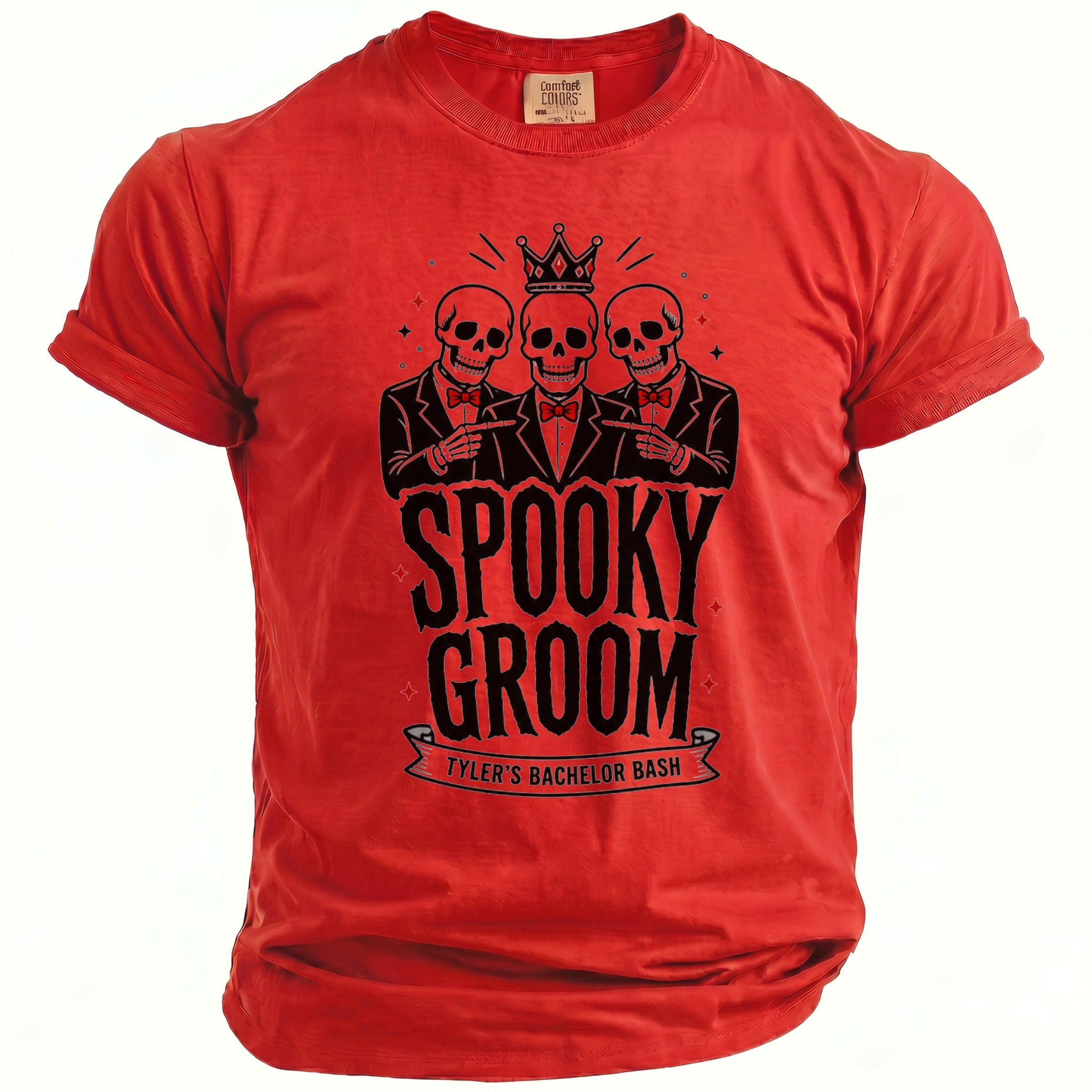 Red t-shirt featuring three skeletons wearing crowns and suits, text "Spooky Groom Tyler's Bachelor Bash."
