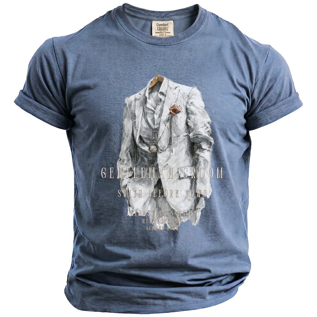 Blue t-shirt with graphic of a white suit, pocket watch and text.