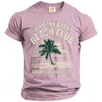 Purple t-shirt with "Bachelor Beach Club" and "Groom's Last Wave 2026" text.