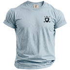 Light blue t-shirt with Comfort Colors tag and black golf crest graphic.