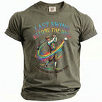 Olive green t-shirt with "Last Swing Before the Ring Bachelor Weekend 2026" golf graphic.