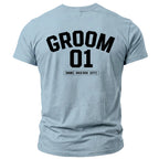 Light blue t-shirt with "GROOM 01 [NAME] BACH 2026 [CITY]" printed on the back.