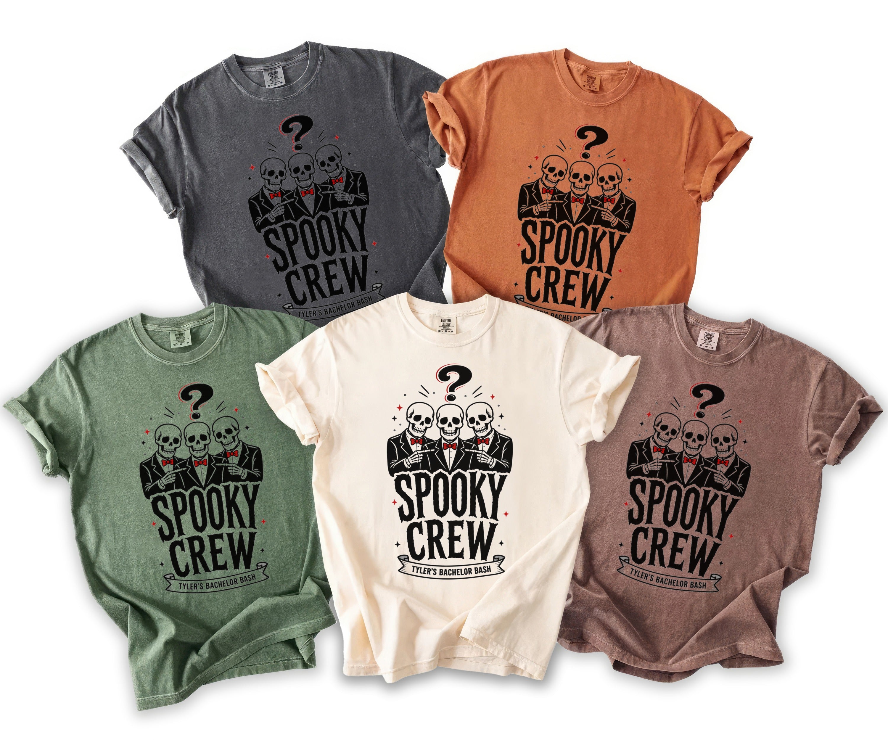 Multiple t-shirts in different colors featuring three skeletons in suits with "Spooky Crew" text.
