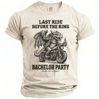 T-shirt with a dragon on a motorcycle holding a bottle, text "Last Ride Before The Ring Bachelor Party".