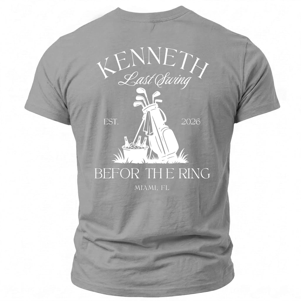 T-shirt with white graphic of golf bag, clubs, cooler, and text "Kenneth Last Swing"