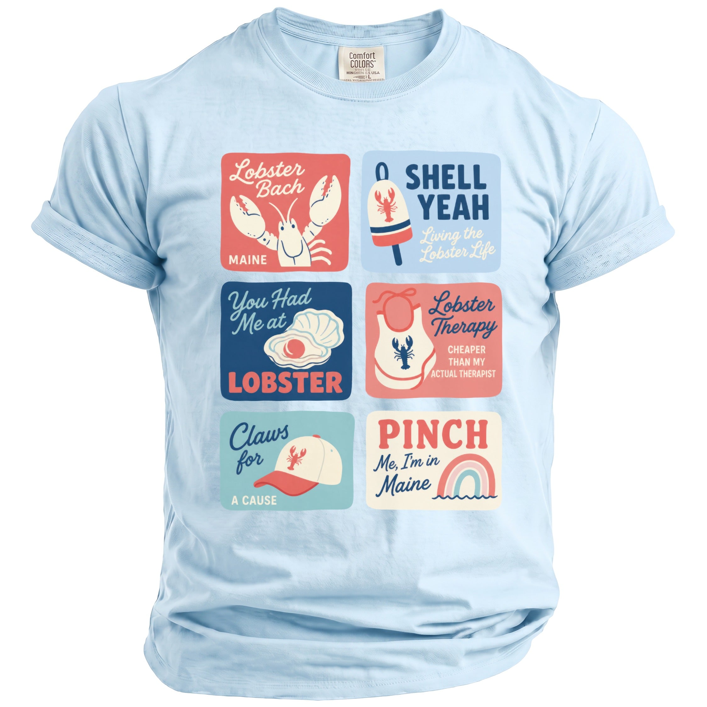 Light blue t-shirt with six colorful graphic panels featuring lobster themes and Maine sayings.