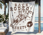 White banner with "BACH RODEO PARTY" text, cowboy on bull design, and "KENNETH EST. 2026"