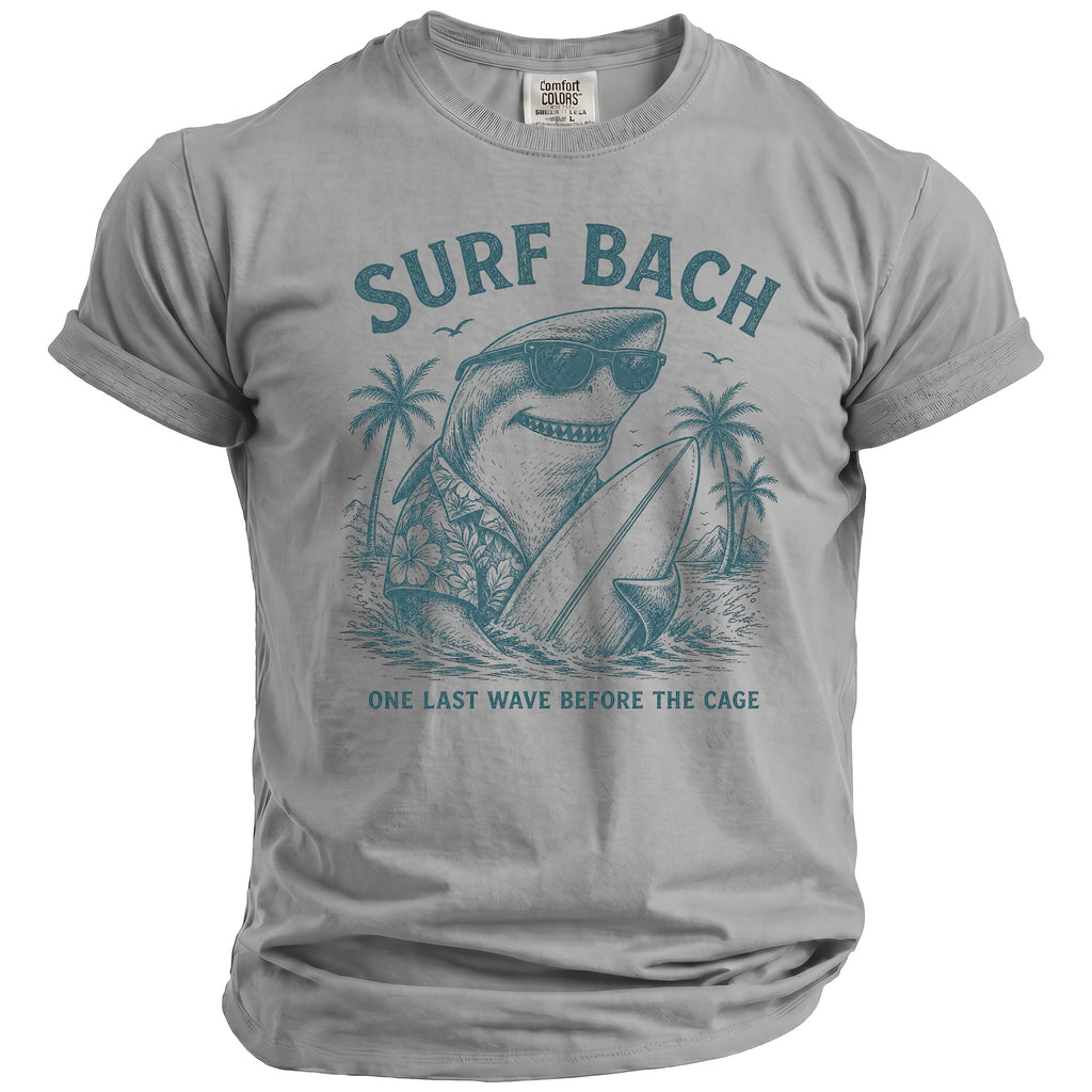 Grey t-shirt with "Surf Bach" text and a shark wearing sunglasses on a surfboard.