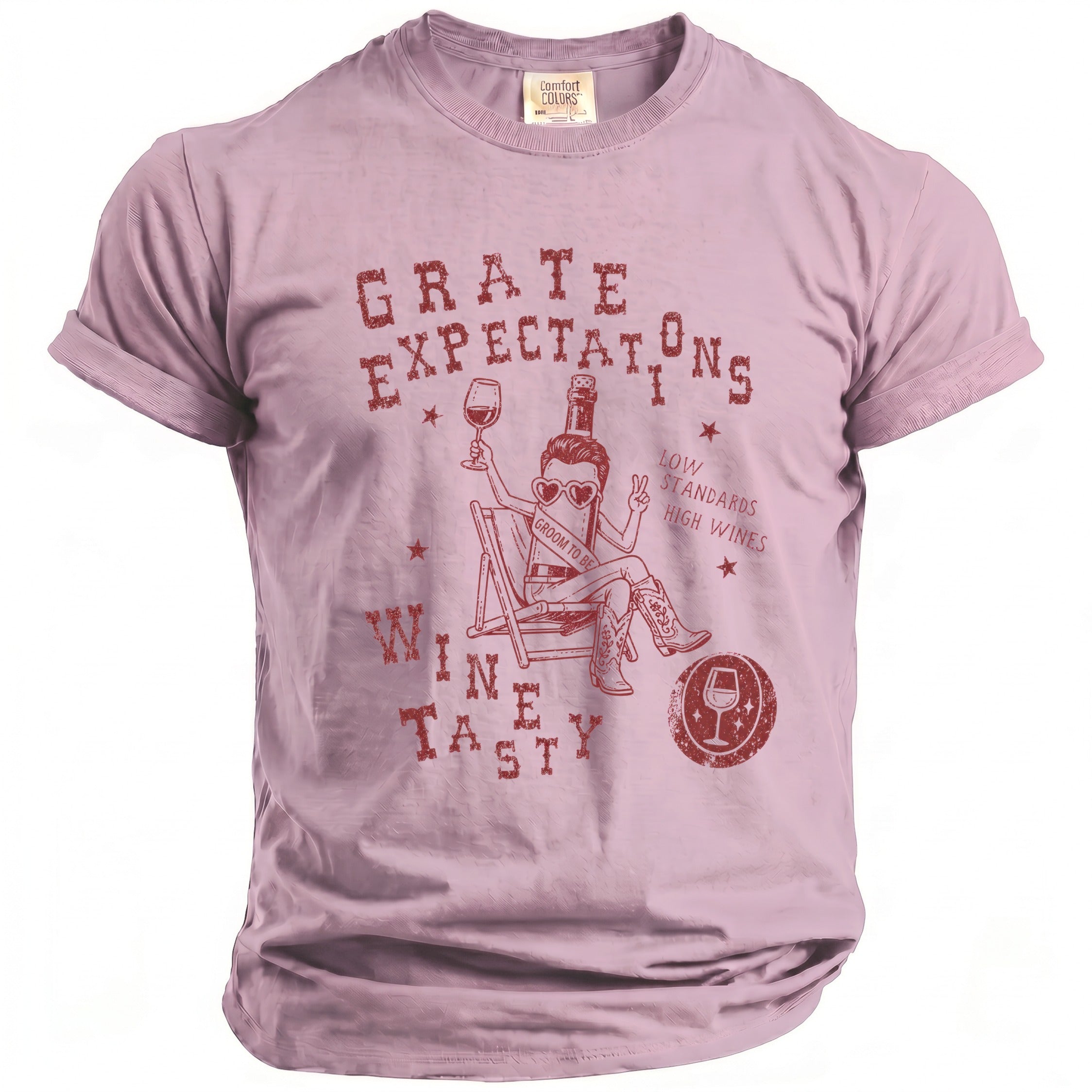 Pink t-shirt with "GRATE EXPECTATIONS" and "WINE IS TASTY" text.