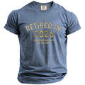 Blue t-shirt with "Retired in 2026 I Worked My Whole Life For This Shirt" text.