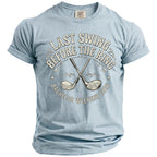 Light blue t-shirt with "Last Swing Before The Ring Bachelor Weekend 2026" and golf clubs.
