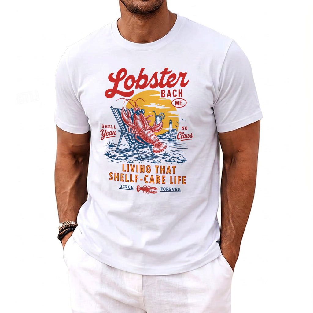 White t-shirt with "Lobster Bach Me" and lobster on beach design.