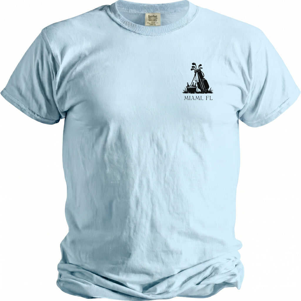 Light blue t-shirt with black graphic of golf bag and MIAMI, FL text.