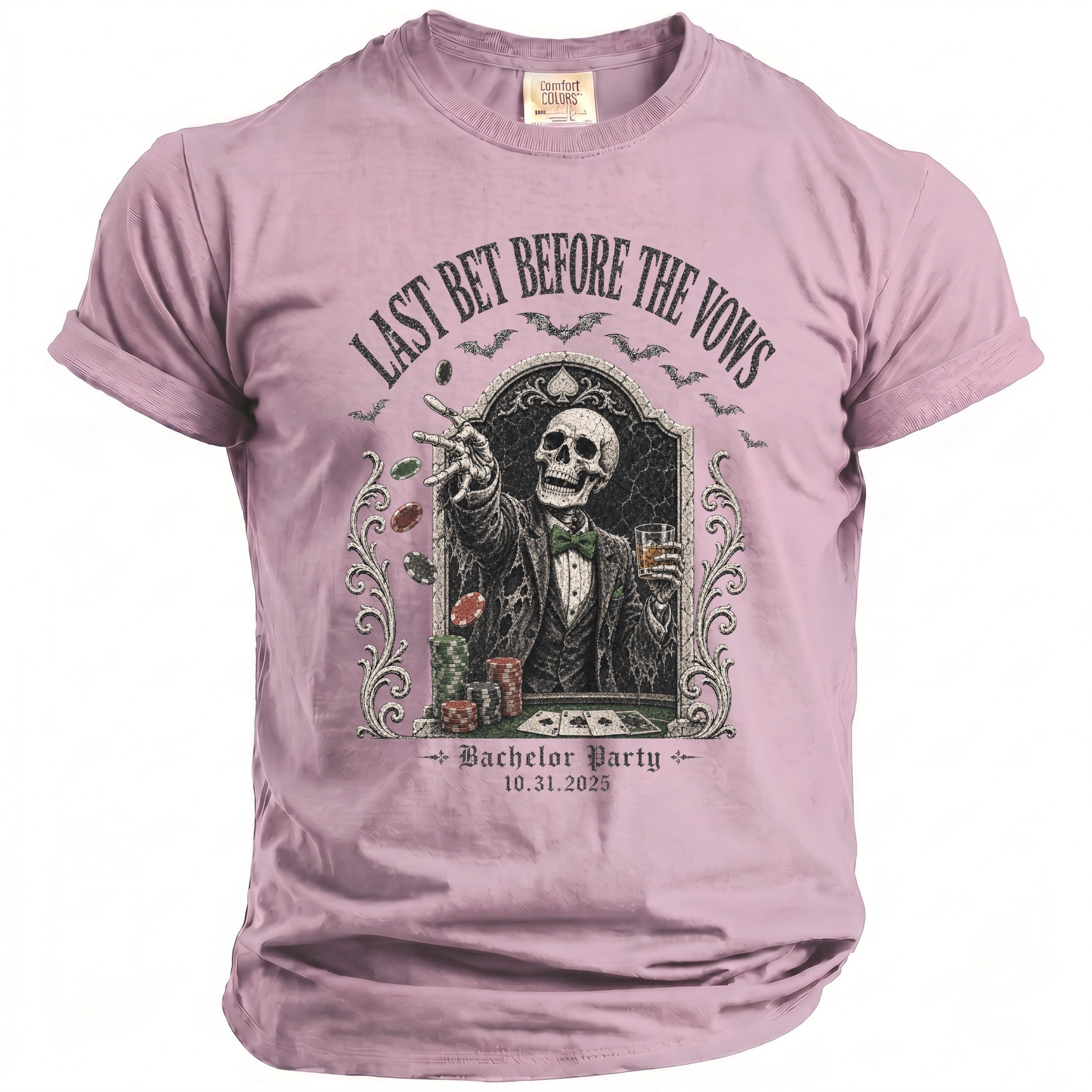 Pink t-shirt with skeleton playing cards and text "Last Bet Before The Vows, Bachelor Party 10.31.2025".