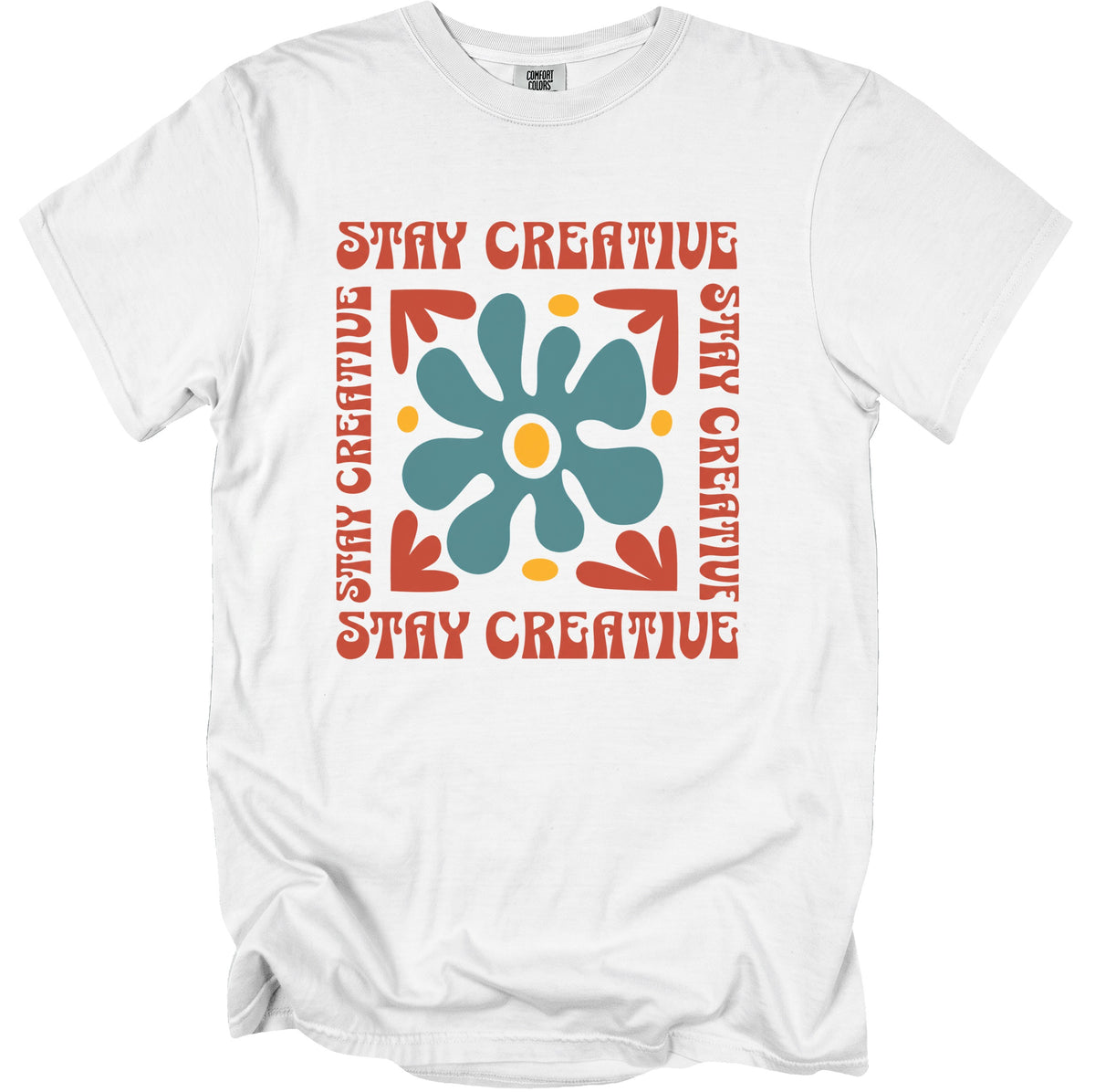 White t-shirt with retro graphic text "STAY CREATIVE" and a blue floral design.