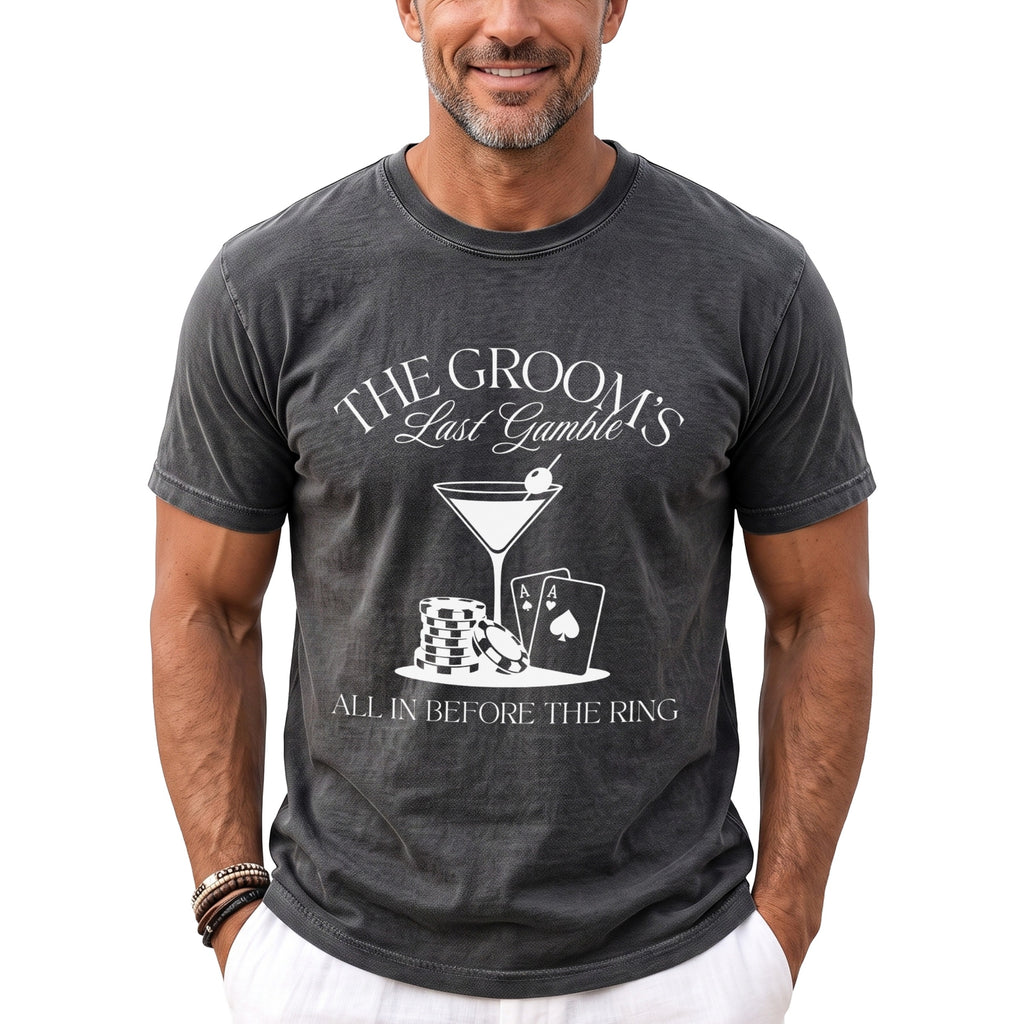 Dark grey t-shirt with "The Groom's Last Gamble" and gambling graphics.