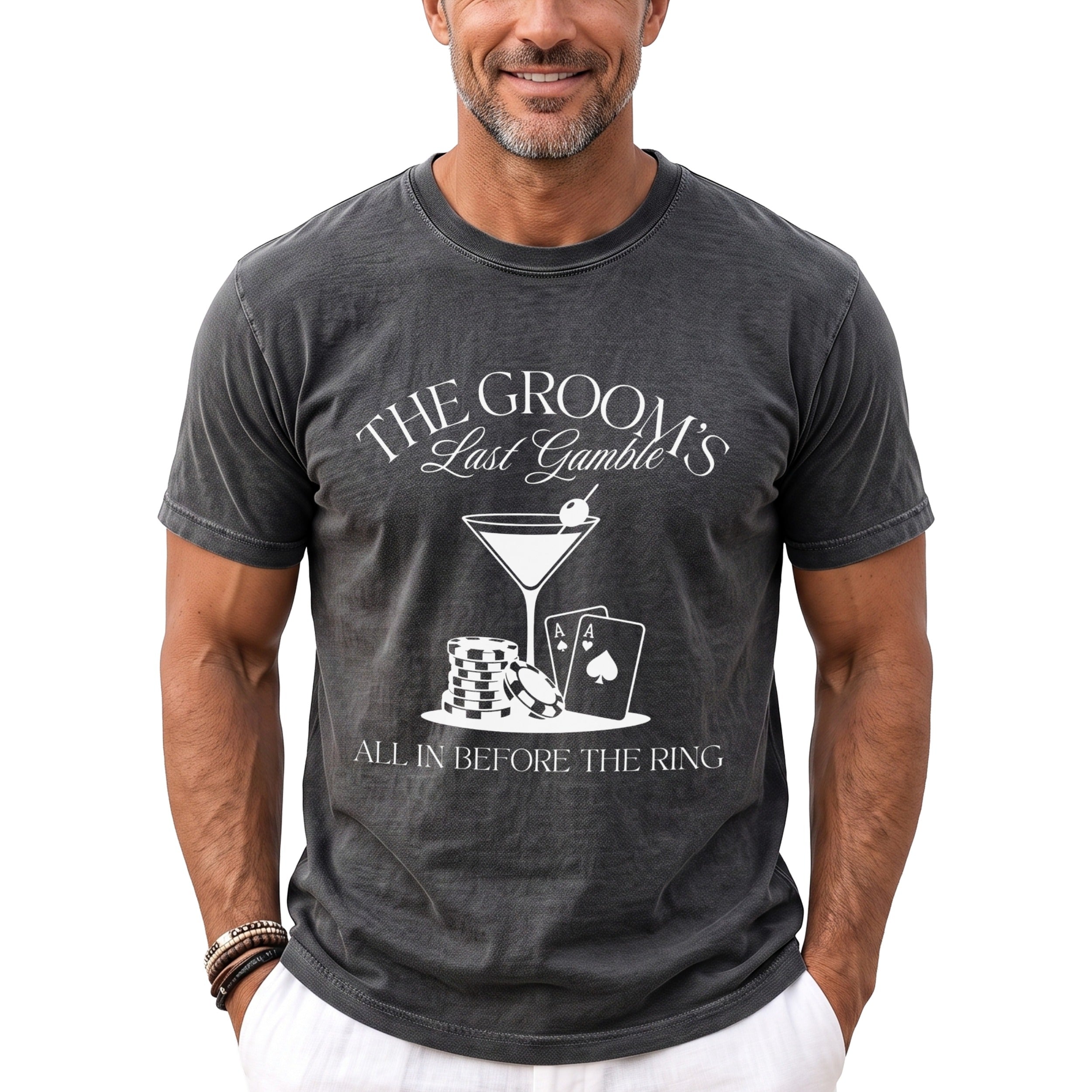 Dark grey t-shirt with "The Groom's Last Gamble" and gambling graphics.